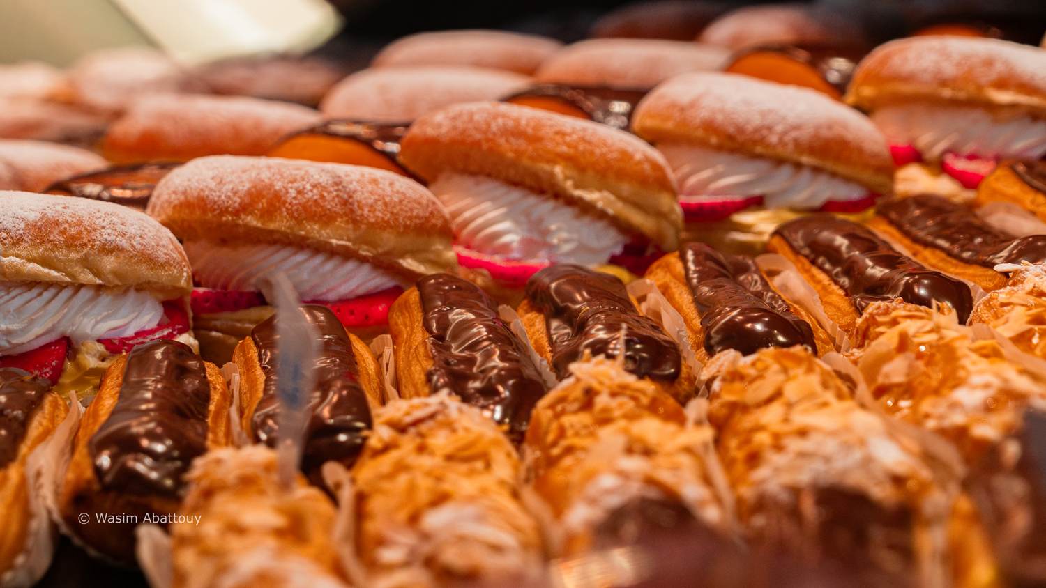 Pastries and bread in a bakery display