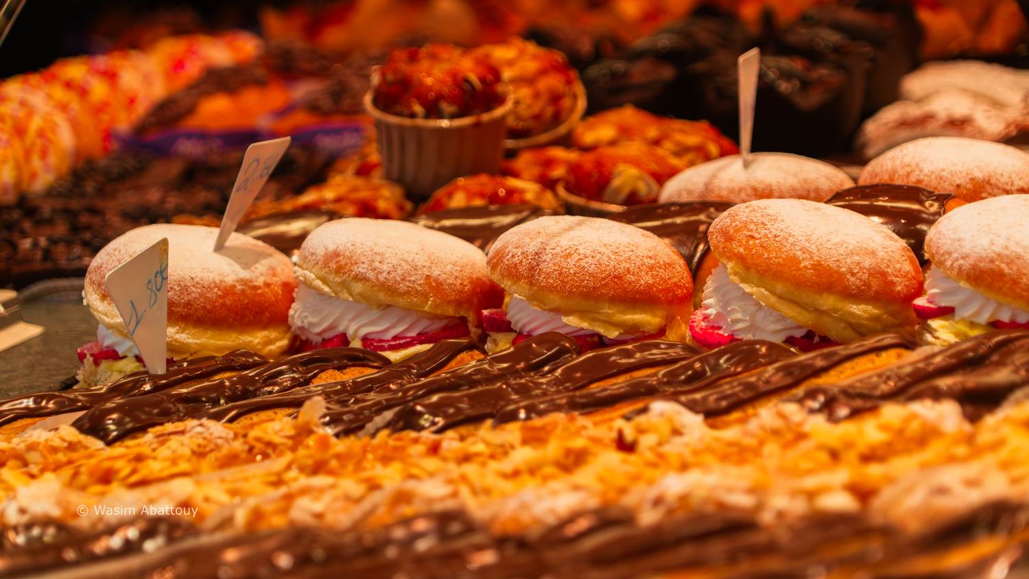 Pastries and bread in a bakery display