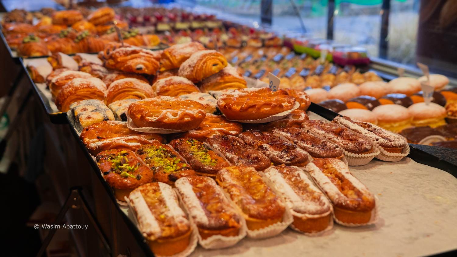 Pastries and bread in a bakery display