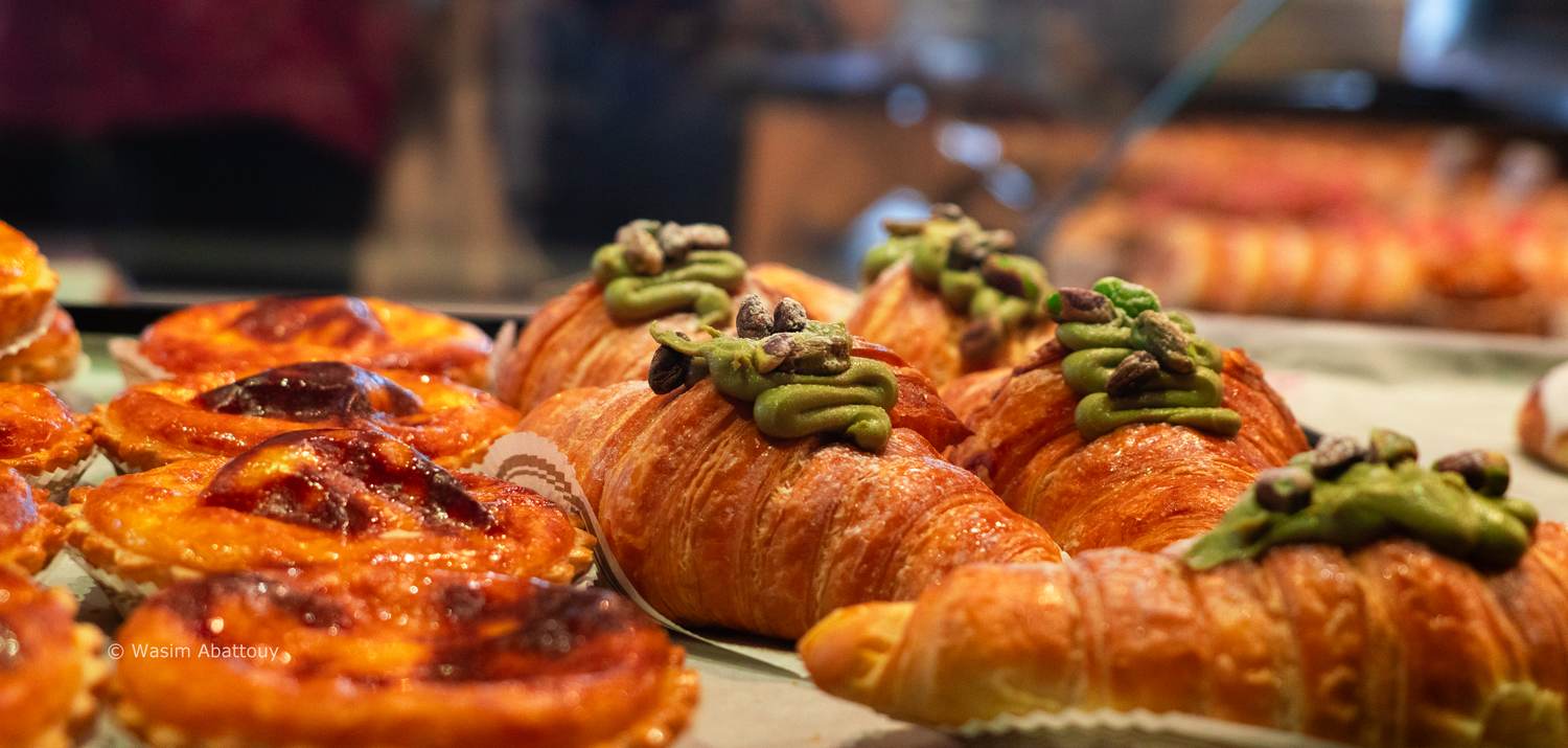 Pastries and bread in a bakery display